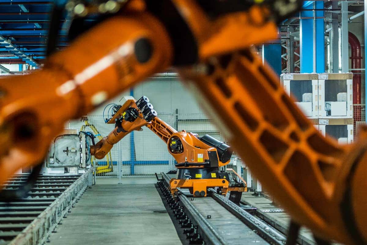 Robotic arm in an industrial factory setting